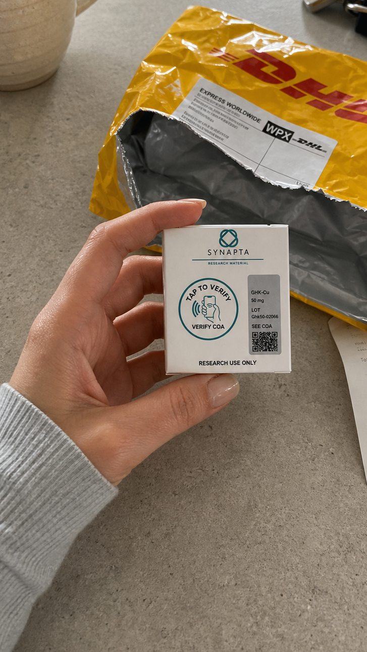 Synapta Labs box with DHL package and verification QR code